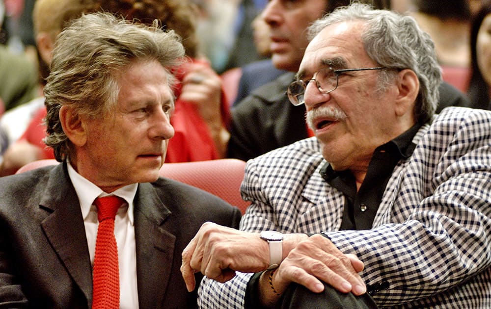 FILE - In this Dec.13, 2002 file photo, film director Roman Polanski, left, and Colombian Nobel laureate Gabriel Garcia Marquez speak during the closing ceremony of the Cuban International Film Festival in Havana, Cuba.