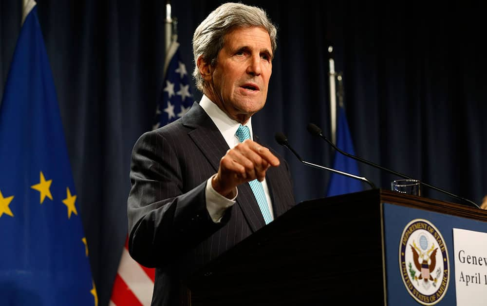 US Secretary of State John Kerry speaks to the media after attending a quadrilateral meeting between representatives of the United States, Ukraine, Russia and the European Union about the ongoing situation in Ukraine in Geneva.