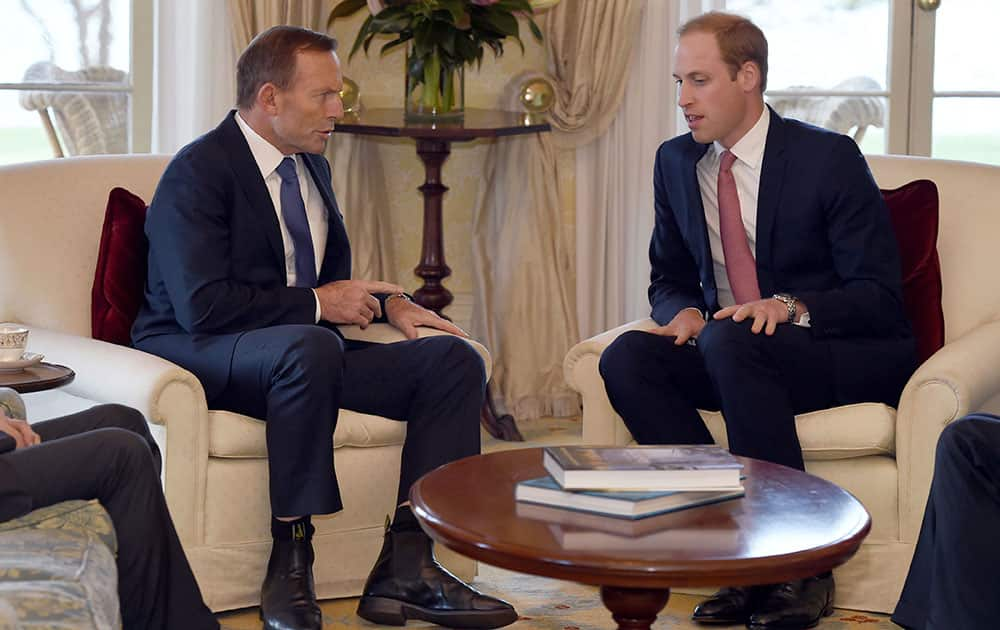 Britain`s Prince William meets with Australian Prime Minister Tony Abbott at Admiralty House in Sydney.