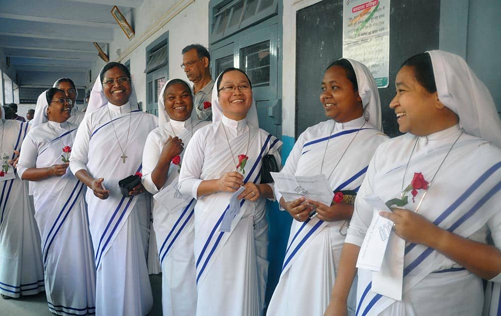 Catholic nuns stand in a queue to cast their votes in Ranchi, Jharkhand.