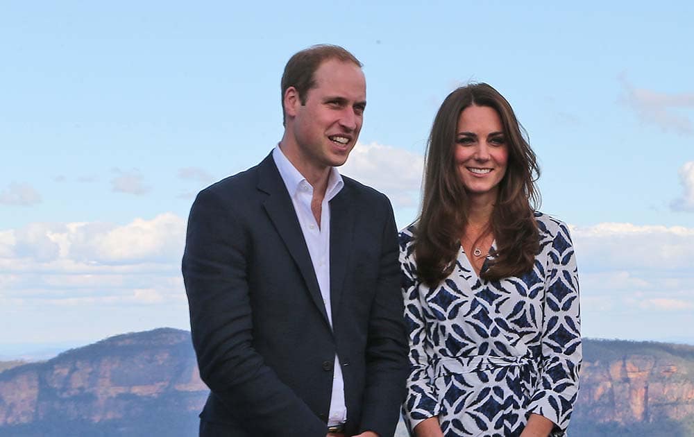 Britain`s Prince William and his wife Kate, the Duchess of Cambridge pose for a photo at Echo Point Lookout in Katoomba, Australia.
