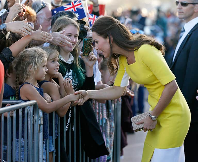 Britain`s Kate, the Duchess of Cambridge, meets with people on the steps of the Sydney Opera House following a reception in Sydney, Australia.