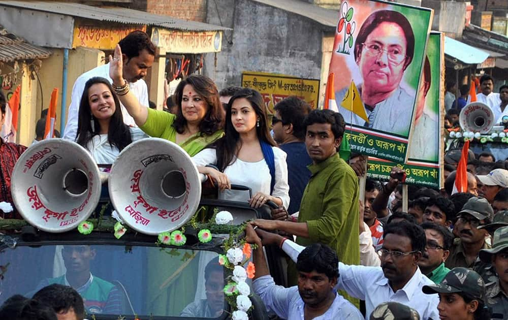 TMC candidate Moonmoon Sen with her daughters during her election campaign in Bankura constituency in West Bengal.