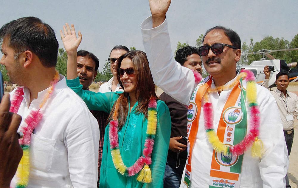 Actress Neha Dhupia campaigns for Congress party during the Lok Sabha elections in Sambhal.