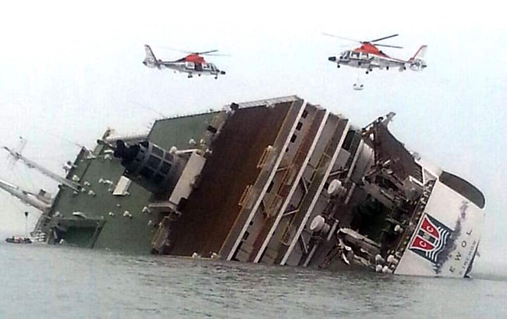 South Korean rescue helicopters fly over a South Korean passenger ship, trying to rescue passengers from the ship in water off the southern coast in South Korea. The South Korean passenger ship carrying more than 470 people, including many high school students, is sinking off the country`s southern coast Wednesday after sending a distress call, officials said. There are no immediate reports of causalities. 