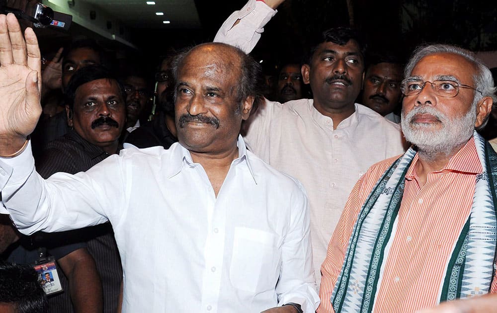 BJP Prime Ministerial candidate Narendra Modi with superstar Rajinikanth at his residence in Chennai.