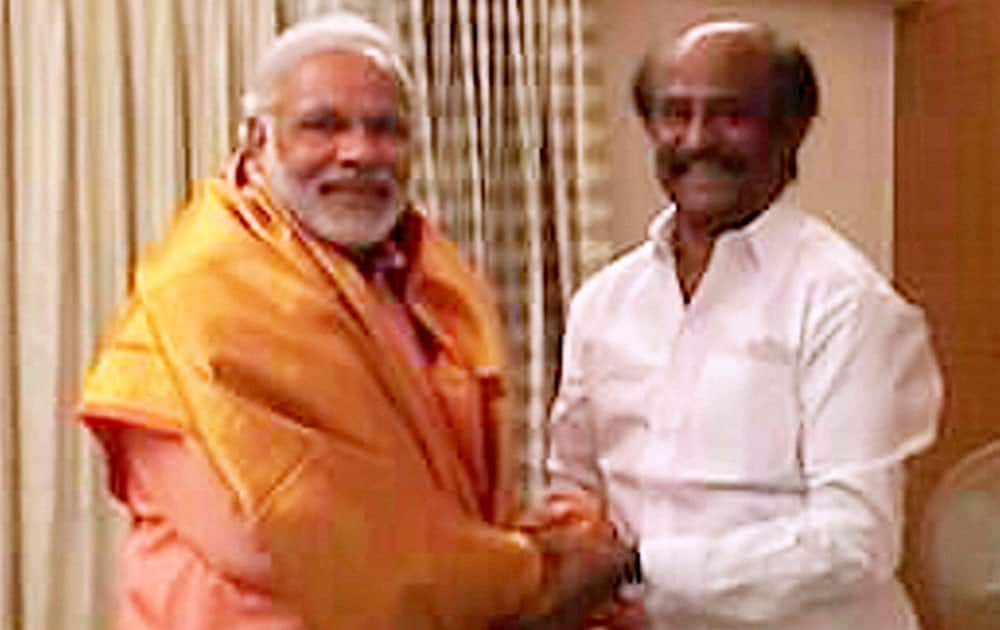 BJP Prime Ministerial candidate Narendra Modi being greeted by superstar Rajinikanth in Chennai.