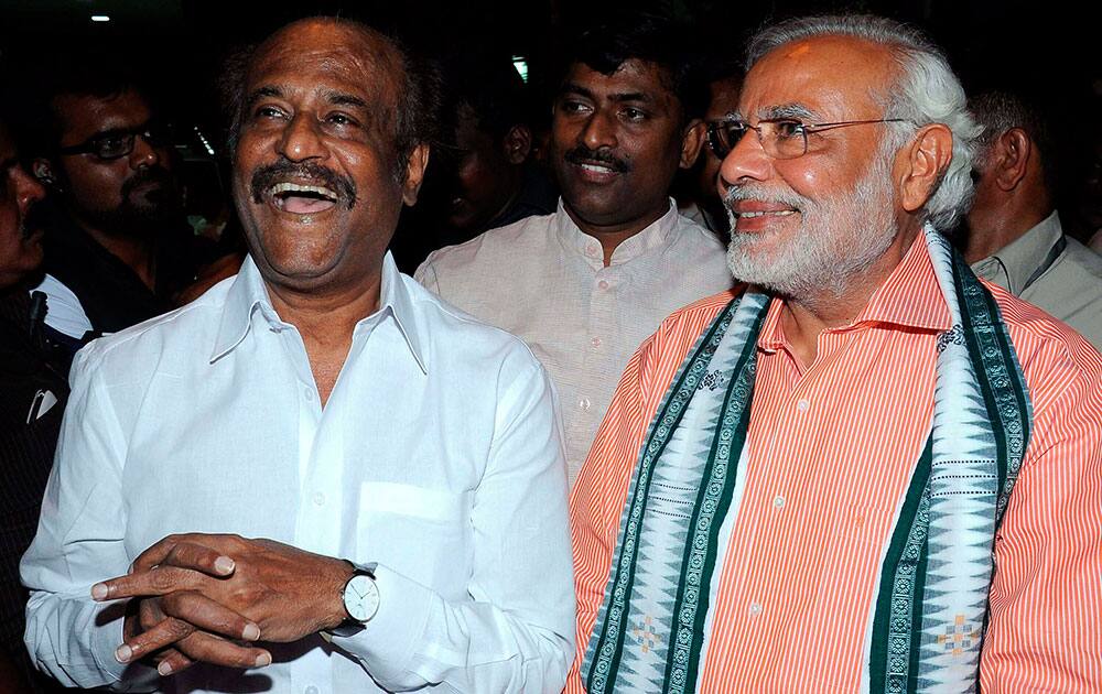 BJP Prime Ministerial candidate Narendra Modi with superstar Rajinikanth at his residence in Chennai.