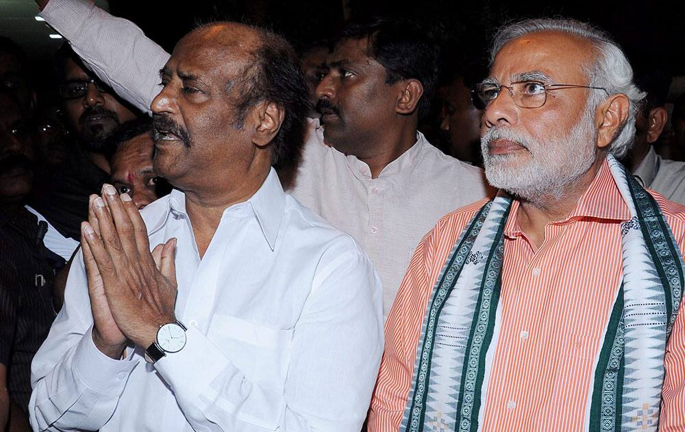 BJP Prime Ministerial candidate Narendra Modi with superstar Rajinikanth at his residence in Chennai.