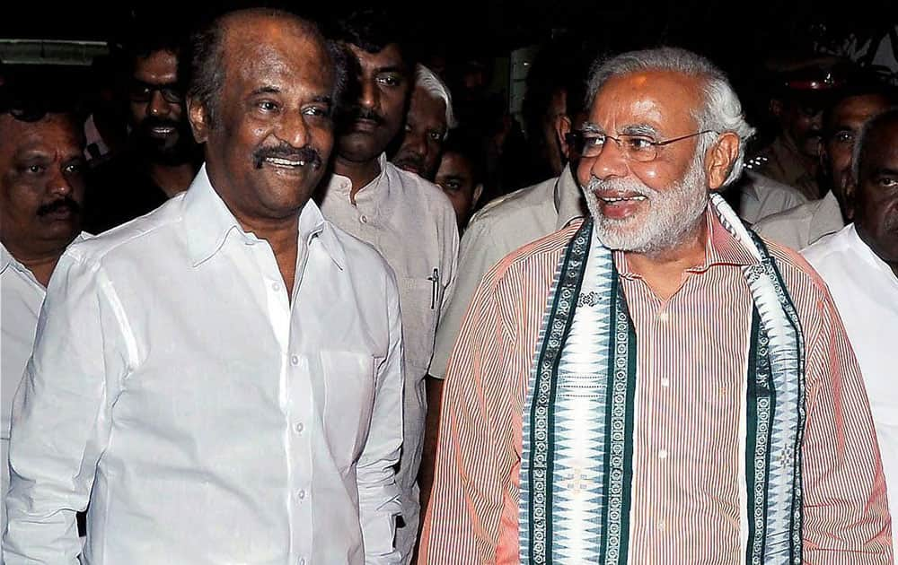 BJP Prime Ministerial candidate Narendra Modi with superstar Rajinikanth at his residence in Chennai.