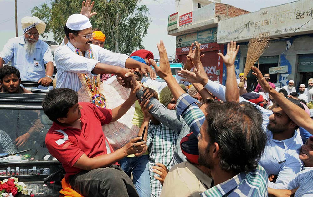 Malerkotla: AAP Chief Arvind kejriwal during an election campaign at Malerkotla on Sunday for party candidate Bhagwant Mann from Sangrur.