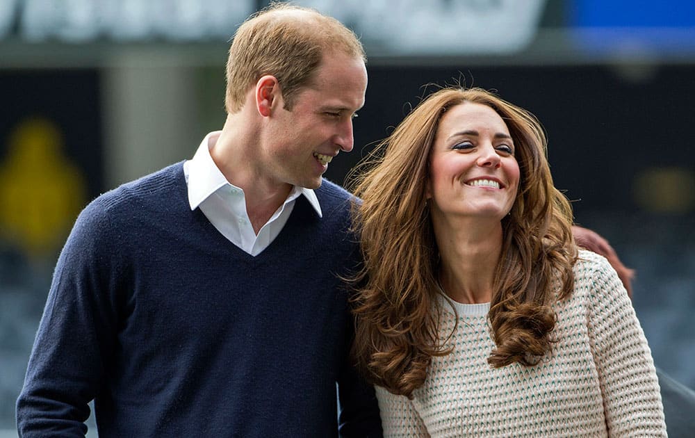 Britain`s Prince William and his wife Kate, the Duchess of Cambridge, visit a young players’ rugby tournament, at Forsyth Barr Stadium, in Dunedin, New Zealand.