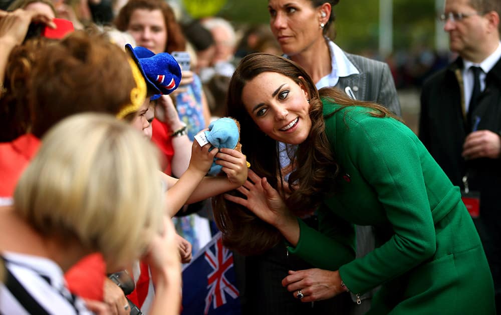 Britain`s Kate, Duchess of Cambridge meets the people in Cambridge, New Zealand. The Duke and Duchess of Cambridge are on a three-week tour of Australia and New Zealand, the first official trip overseas with their son, Prince George of Cambridge.