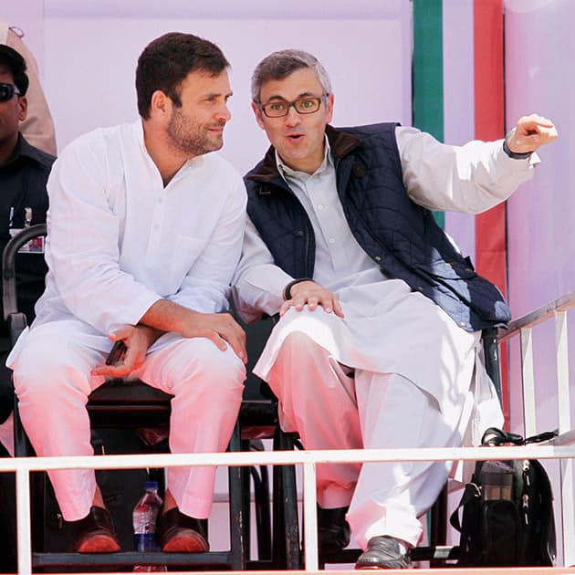 Congress Vice President Rahul Gandhi with Jammu and Kashmir Chief Minister Omar Abdullah at an election campaign rally in Doda, J & K.