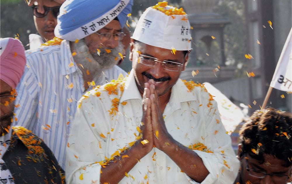 AAP convener Arvind Kejriwal during an election roadshow in support of party candidate Daljit Singh in Amritsar.