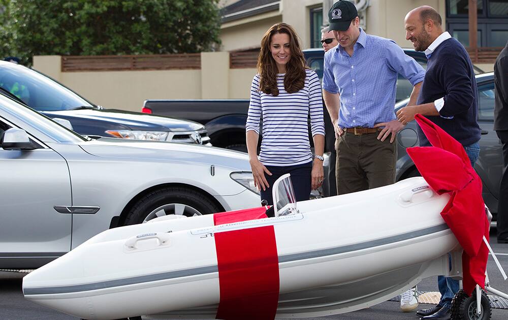 Britain`s Prince William and his wife Kate, the Duchess of Cambridge receive a gift of a small Sealegs Craft for Prince George after they travelled by Sealegs craft to Westpark Marina, Auckland, New Zealand.