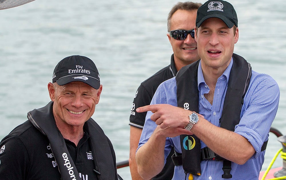Britain`s Prince William points a finger at Grant Dalton, CEO of Team New Zealand as they lost to his wife Kate, the Duchess of Cambridge, in a match-race sailing on Americas Cup yachts, Auckland, New Zealand.