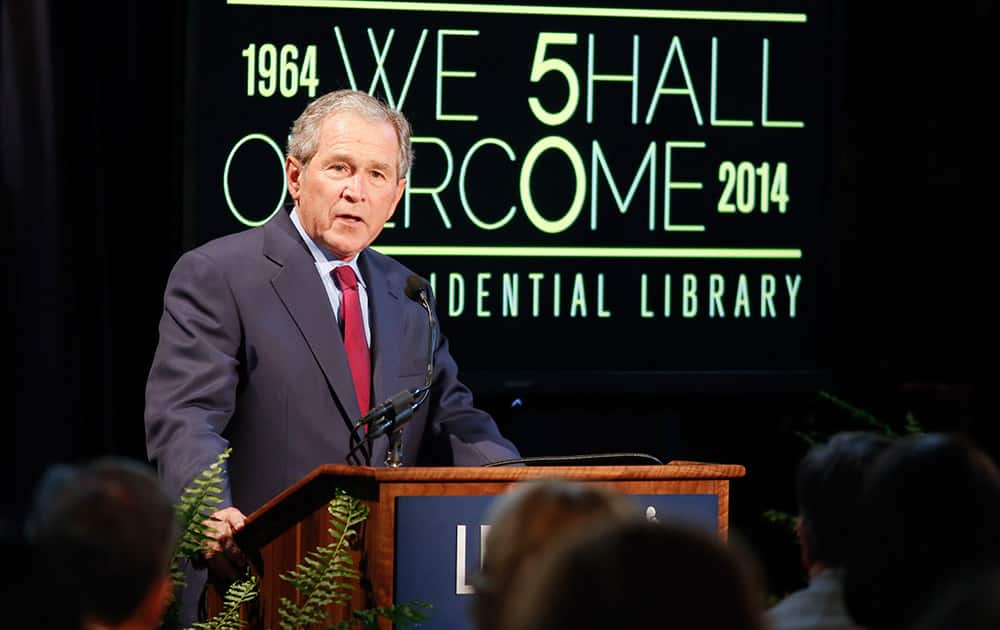 Former President George W. Bush gives an address during the Civil Rights Summit, in Austin, Texas.