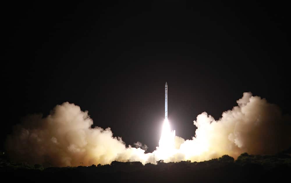 In this photo released by the Israel Defense Ministry, a new Israeli satellite, Ofek 10, the latest in a line of spy satellites built by Israel Aerospace Industries, is launched late Wednesday at an airbase in central Israel, according to a defense ministry announcement.