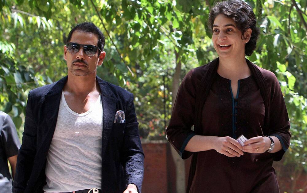 Priyanka Vadra and her husband Robert Vadra arrive to cast their vote during parliamentary elections in New Delhi.