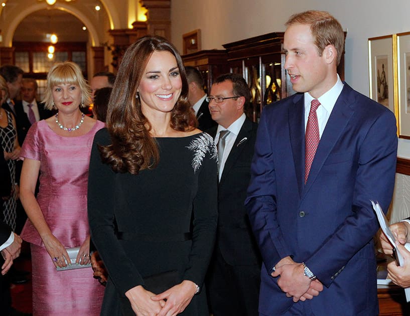 Britain`s Prince William and Kate, the Duchess of Cambridge, arrive for a state reception at Government House in Wellington, New Zealand