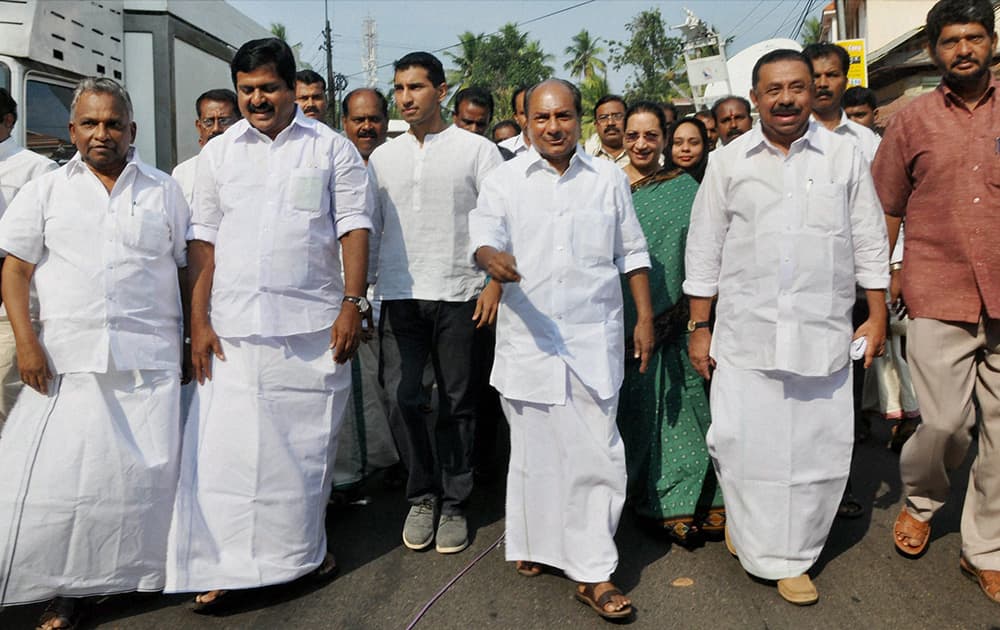 Defence Minister A K Antony arrives to cast his vote for Lok Sabha election at a polling booth in Thiruvananthapuram.