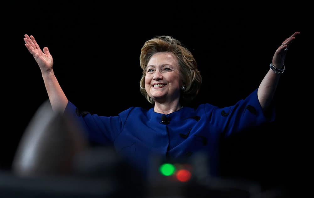 Former Secretary of State Hillary Rodham Clinton gestures before delivering the keynote address at Marketo’s 2014 Marketing Nation Summit in San Francisco.