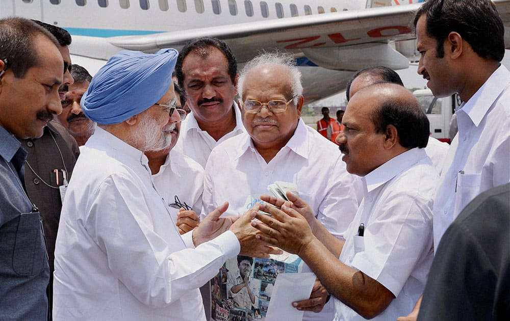 Prime Minister Manmohan Singh received by the Minister for Public Works of the Government of Kerala V K Ibrahim Kunju at Kochi Southern naval Airport.