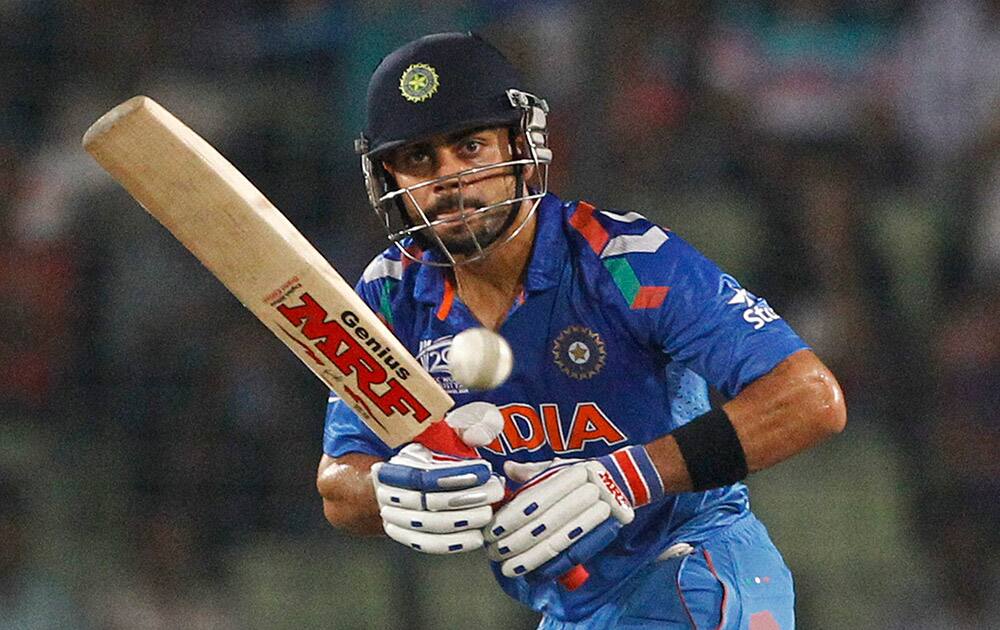 India`s Virat Kohli plays a shot during their ICC Twenty20 Cricket World Cup semifinal match against South Africa in Dhaka, Bangladesh.