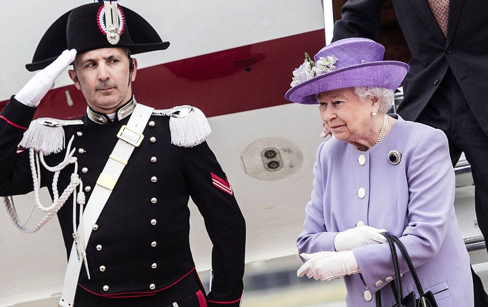 Queen Elizabeth II arrives at Rome`s Ciampino military airport to start a one-day visit to Italy and the Vatican.