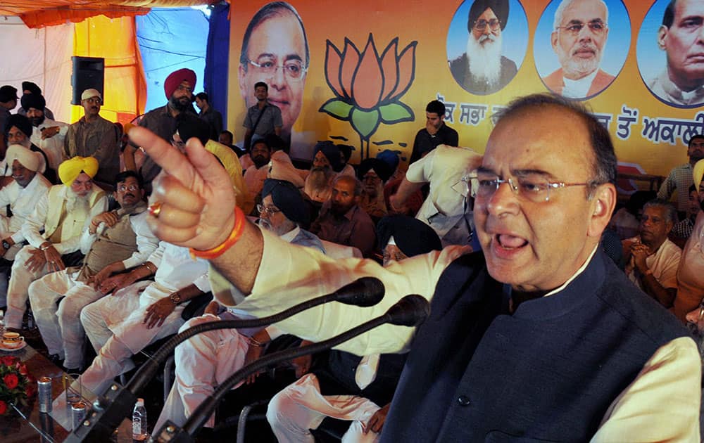 BJP`s candidate from Amritsar Arun Jaitley addresses during an election rally in Majitha village near Amritsar.