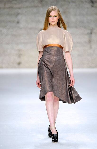 A model displays a creation by Portuguese designer Fatima Lopes during the Portugal Fashion Fall/Winter 2014/2015 week, in Porto, Portugal.