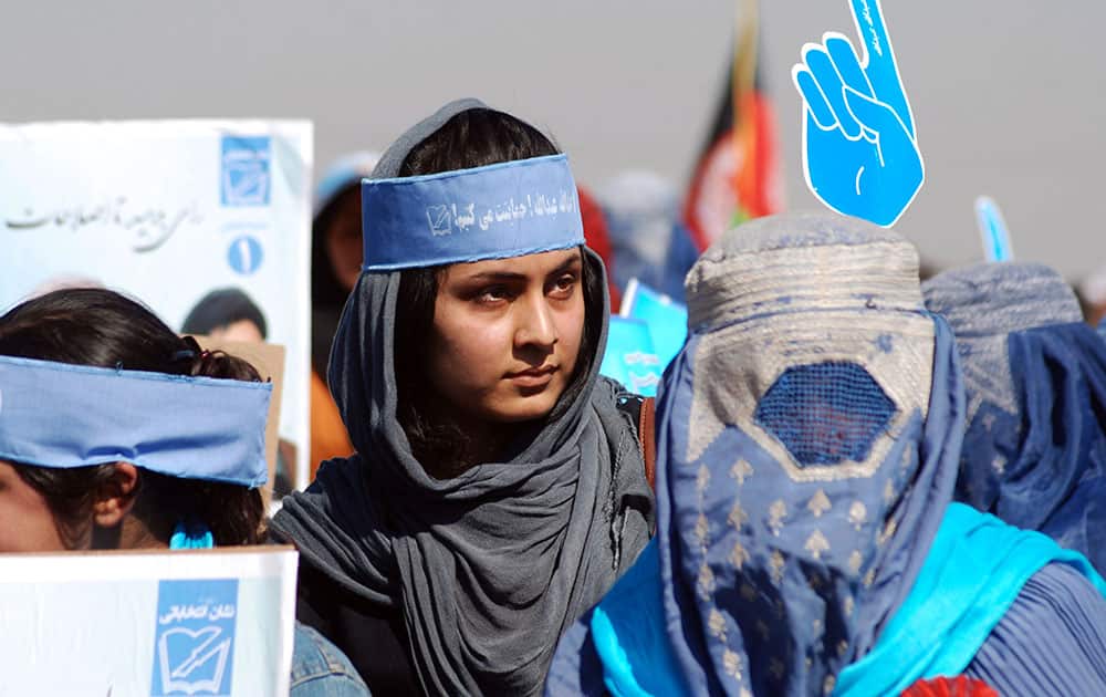 Afghan women attend a campaign rally of presidential candidate Abdullah Abdullah in Mazar-e-Sharif, Afghanistan.