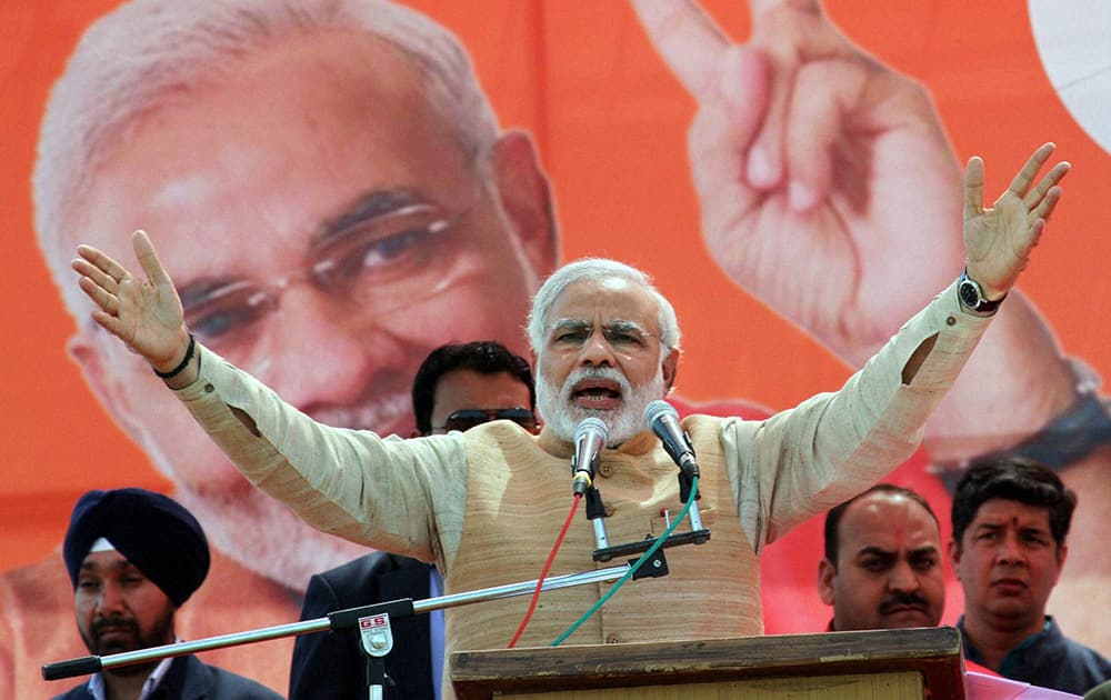 BJPs Prime Ministerial candidate Narendra Modi addresses an election rally at Hira Nagar town in Kathua district.