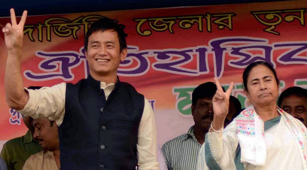 West Bengal Chief Minister and TMC chief Mamata Banerjee with party candidate Baichung Bhutia during an election campaign rally at Naxalbari near Siliguri.
