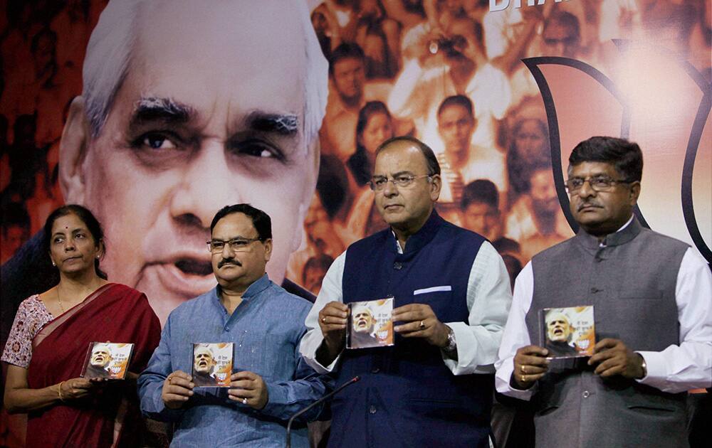 Senior BJP leader Arun Jaitley with other leaders releases the party’s poll anthem for the upcoming Lok Sabha poll at party headquarters in New Delhi.