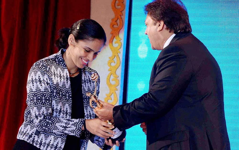 Badminton star Saina Nehwal is honoured during the 13th GR8 Women Awards function in Hyderabad.