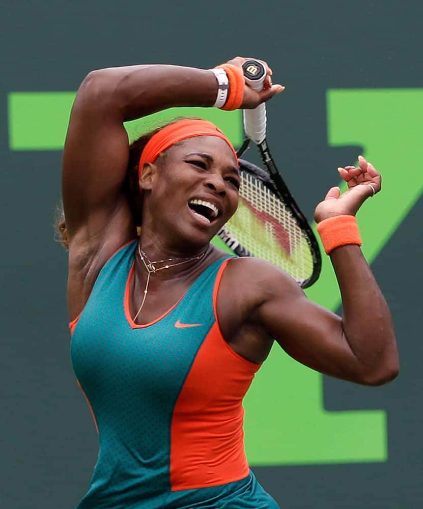 Serena Williams, of the United States, returns to Caroline Garcia, of France, at the Sony Open tennis tournament in Key Biscayne, Fla.