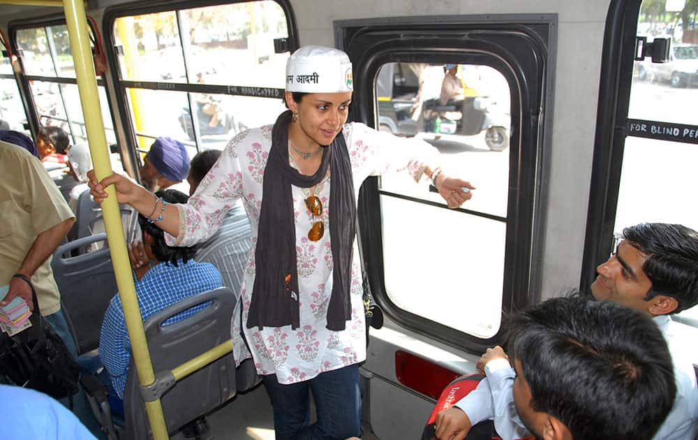 Aam Aadmi Party, or Common Man Party, nominee and former Miss India Gul Panag campaigns on a public bus in Chandigarh.