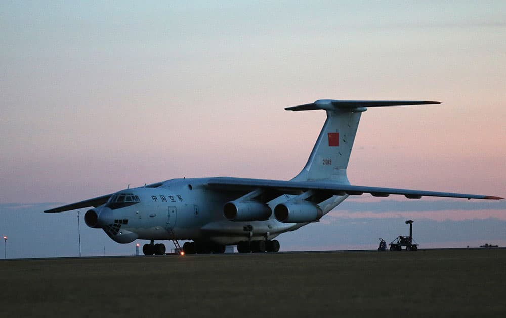 Two Chinese Ilyushin IL-76s aircraft sit on the tarmac at RAAF Pearce base ready to join the search missing Malaysia Airlines flight MH370 in Perth, Australia.