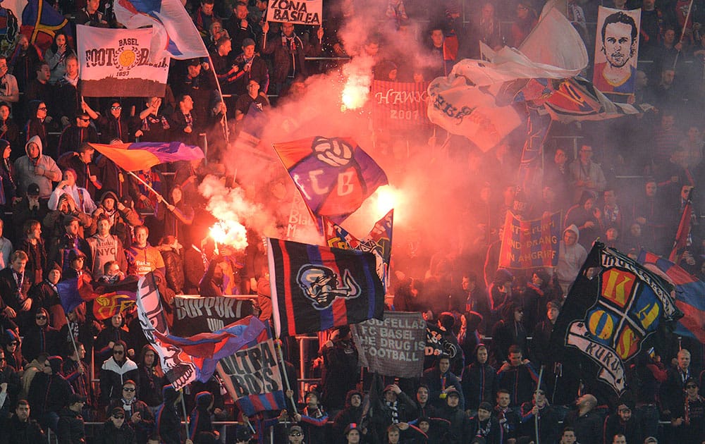 Basel`s fans light fireworks during the Europa League round of 16 second leg soccer match between Red Bull Salzburg and FC Basel in Salzburg, Austria.
