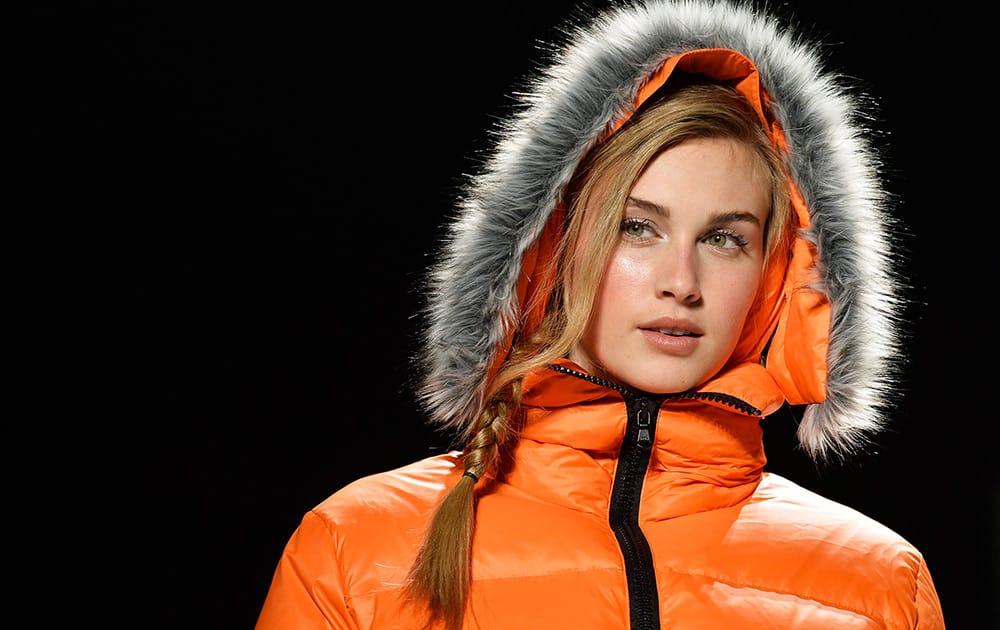 A model shows a creation from Joe Fresh while walking the runway during Toronto Fashion Week in Toronto.