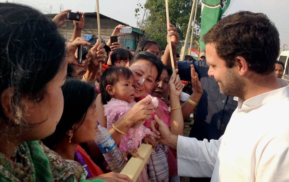 Congress vice president Rahul Gandhi meets people during an election campaign rally in Imphal, Manipur.