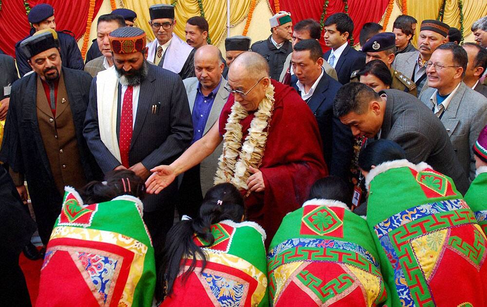 Tibetan leader the Dalai Lama meets with students during the 21st Convocation Ceremony of HP University in Shimla.