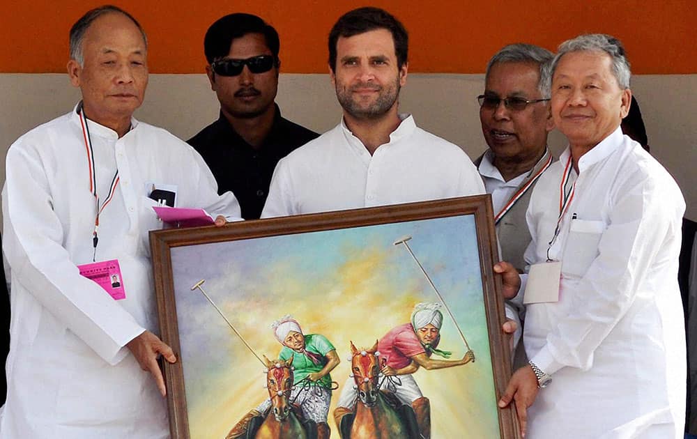 Congress Vice President Rahul Ghandhi receiving a painting from Manipur CM O Ibobi Singh at an election rally at Wangjing Kodompokpi Ground in Thoubal district of Manipur.