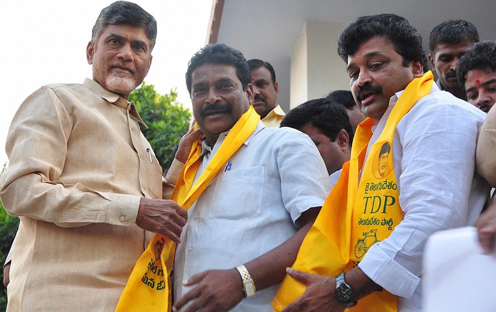 TDP chief N Chandrababu Naidu welcomes Singireddy Harivardhan Reddy along and his supporters who joined TDP in Hyderabad.