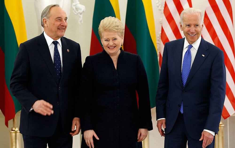 US Vice President Joe Biden, Lithuania`s President Dalia Grybauskaite, center, and Liatvia`s President Andris Berzins, left, pose for photographers prior to their meeting at the Presidential palace in Vilnius, Lithuania.