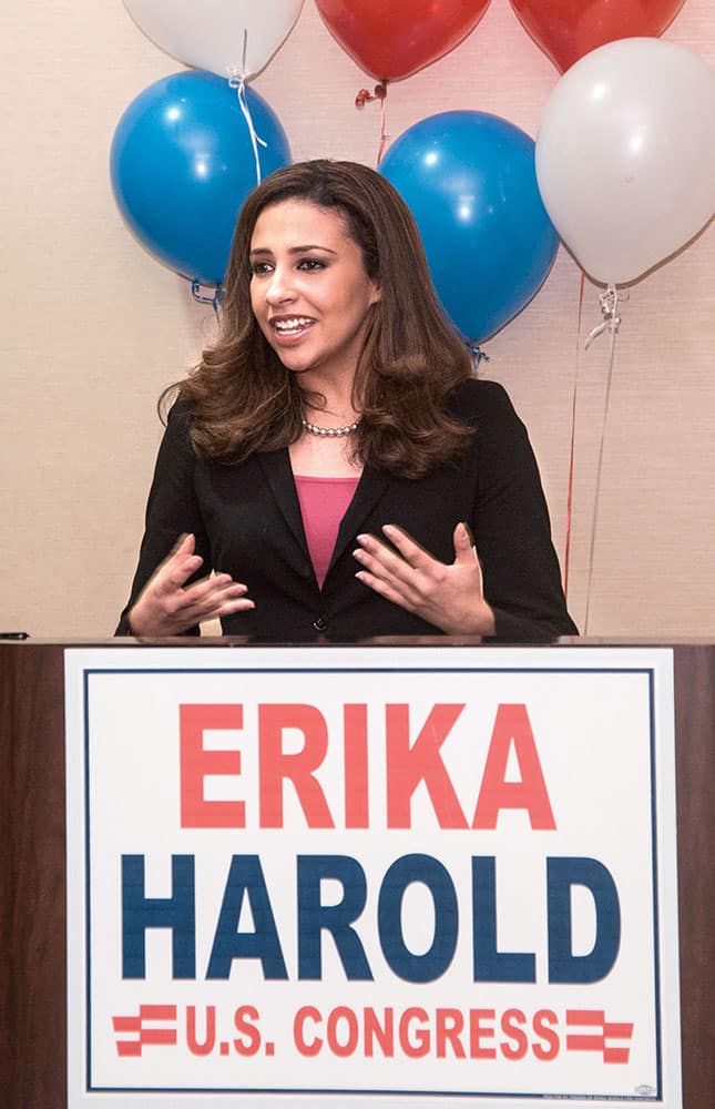 Erika Harold, Republican primary candidate for the13th Congressional District of Illinois, talks to supporters at the Hilton Garden Inn in Champaign, Ill.