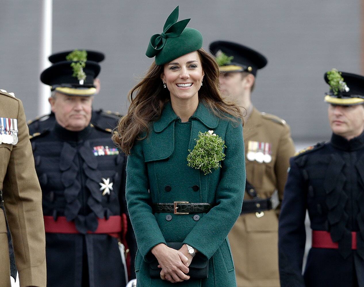 Kate, The Duchess of Cambridge smiles during a visit to the 1st Battalion Irish Guards at the St. Patrick`s Day Parade at Mons Barracks, Aldershot, in England. The Duke of Cambridge attended the Parade as Colonel of the Regiment. The Duchess of Cambridge presented the traditional sprigs of shamrocks to the Officers and Guardsmen of the Regiment.