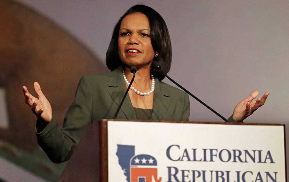 Former Secretary of State Condoleezza Rice gestures while speaking before the California Republican Party 2014 Spring Convention in Burlingame, Calif.